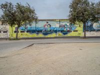 Graffiti-Covered Wall in Barcelona's City Life