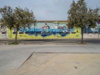 Graffiti-Covered Wall in Barcelona's City Life