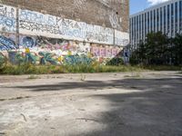 a parking lot has been graffited with graffiti from the past and is empty