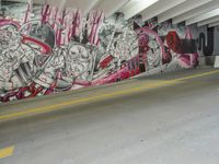 graffiti depicting people walking in an underground parking lot of a building while others walk past