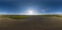 a 360 - ball lens view of a small dirt track in the countryside of california