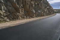 Grey Asphalt Road in African Landscape with Mountain