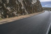 Grey Asphalt Road in African Landscape with Mountain