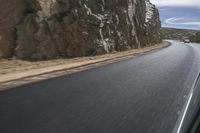 Grey Asphalt Road in African Landscape with Mountain