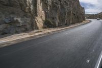 Grey Asphalt Road in African Landscape with Mountain