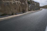 Grey Asphalt Road in African Landscape with Mountain