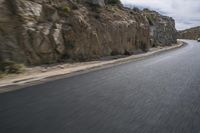 Grey Asphalt Road in African Landscape with Mountain