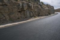 Grey Asphalt Road in African Landscape with Mountain