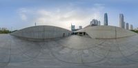 this is an 360 photograph of the city view from the reflecting pool in this park