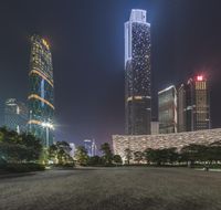 an industrial city with skyscrapers at night in china's central business district,