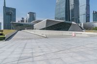 a woman on a skateboard in a big city square of the day and looking at some buildings