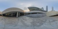 a 360 - angle photo of a building in a large circle, which includes a stone floor and pillars