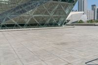 a skateboarder is riding his board in front of the new museum of art