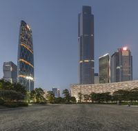 the large buildings of the city are lighted up by street lamps in china's financial district