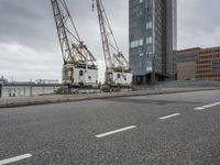 Hamburg, Germany: Urban View with Cranes and Harbor