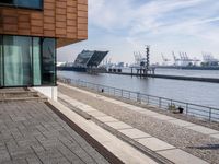 the walkway by the water is being used for traffic and to allow pedestrians and drivers to pass