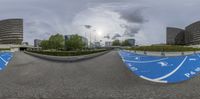 the street view of a man doing a trick on a skateboard in a parking lot