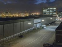 Hamburg Night Cityscape: Industrial Harbor Illuminated