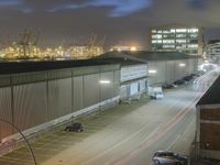 Hamburg Night Cityscape: Industrial Harbor Illuminated