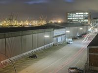Hamburg Night Cityscape: Industrial Harbor Illuminated