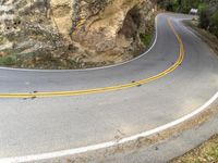 High Mountain Road through Rural Landscape