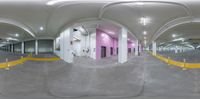 this is a 360 - ray image of the inside of a building, with a pink wall and concrete ceiling