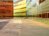 a view of many windows in a building and street in the background is bright green