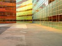 a view of many windows in a building and street in the background is bright green