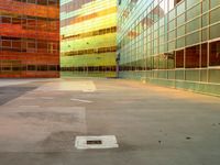 a view of many windows in a building and street in the background is bright green