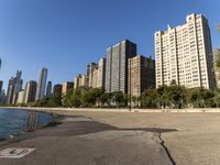 a lake in a city with high rise buildings and a no parking sign posted on it