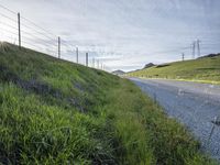 Highland Hills with Asphalt Road and Green Fields 002