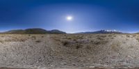 a 360 - vr photo of the desert landscape in arizona, usa with mountains in distance