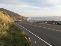 Highway Along the Ocean Cliff: Enjoying a Clear Sky