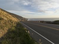 Highway Along the Ocean Cliff: Enjoying a Clear Sky