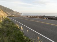 Highway Along the Ocean Cliff: Enjoying a Clear Sky