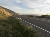 Highway Along the Ocean Cliff: Enjoying a Clear Sky