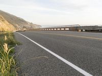 Highway Along the Ocean Cliff: Enjoying a Clear Sky