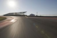 Highway Through the Scenic Landscape: Sunrise and Motion Blur of Cars