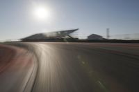 Highway Through the Scenic Landscape: Sunrise and Motion Blur of Cars