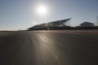 Highway Through the Scenic Landscape: Sunrise and Motion Blur of Cars