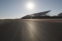 Highway Through the Scenic Landscape: Sunrise and Motion Blur of Cars