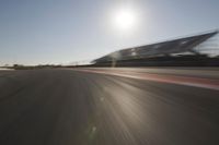 Highway Through the Scenic Landscape: Sunrise and Motion Blur of Cars