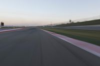 Highway in Motion Blur: Automobiles Against a Clear Sky