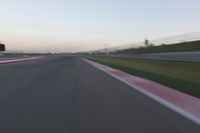 Highway in Motion Blur: Automobiles Against a Clear Sky