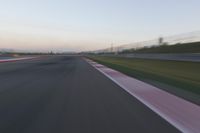 Highway in Motion Blur: Automobiles Against a Clear Sky