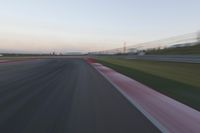 Highway in Motion Blur: Automobiles Against a Clear Sky