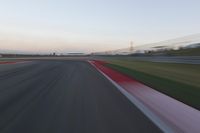 Highway in Motion Blur: Automobiles Against a Clear Sky