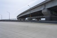 Highway Road with Concrete Bridge, Asphalt and Guard Rail