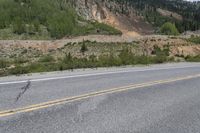 Highway Through Colorado Forest: Yellow Trees and Scenic Views