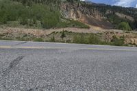 Highway Through Colorado Forest: Yellow Trees and Scenic Views